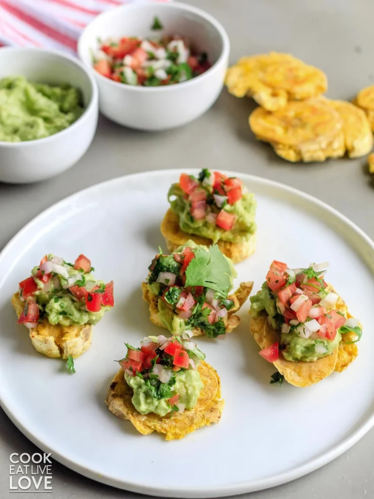 crispy tostones topped with guacamole, salsa