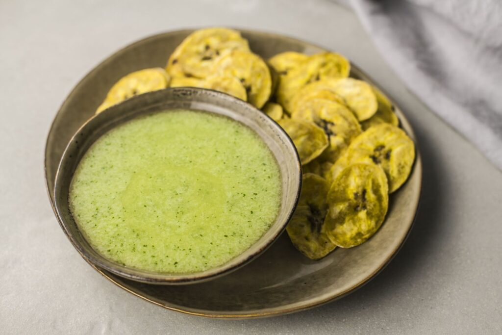 WHAT IS GREEN GARLIC SAUCE FOR TOSTONES?