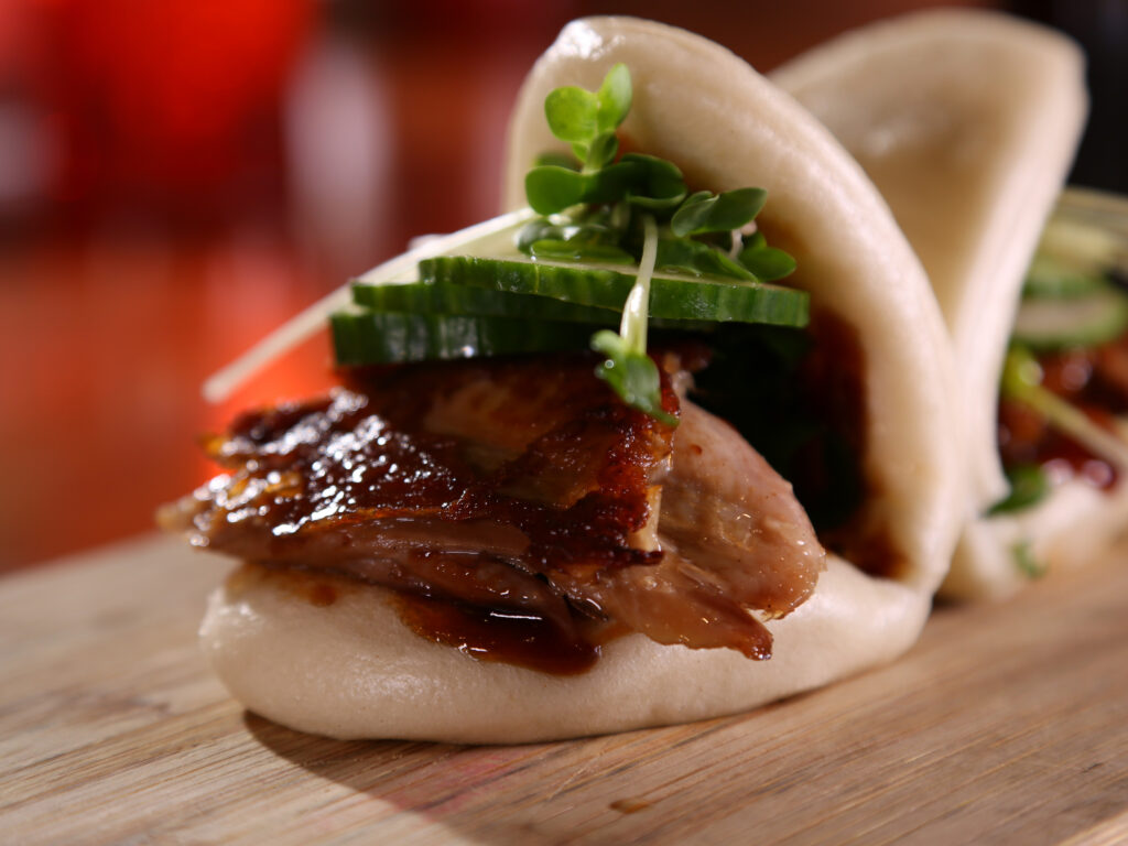 Blending Cuban Flavors with Global Cuisines Mojo-Marinated Pork Belly Bao