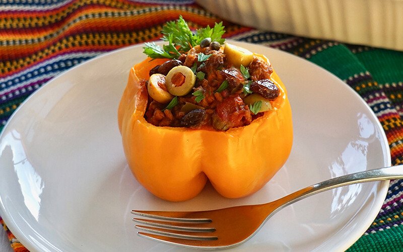 Blending Cuban Flavors with Global Cuisines: Cuban Picadillo Stuffed Peppers with Feta Cheese