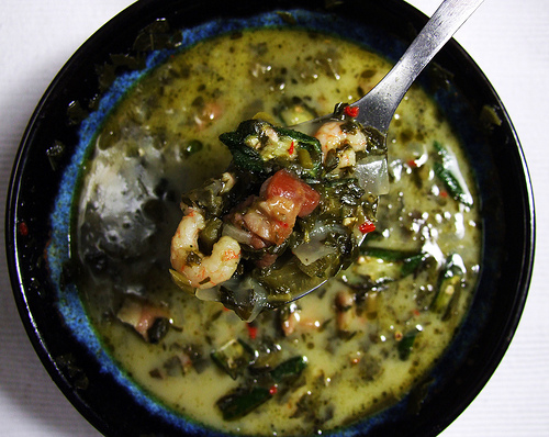 Adding Fish and Spinach in the Callaloo Soup