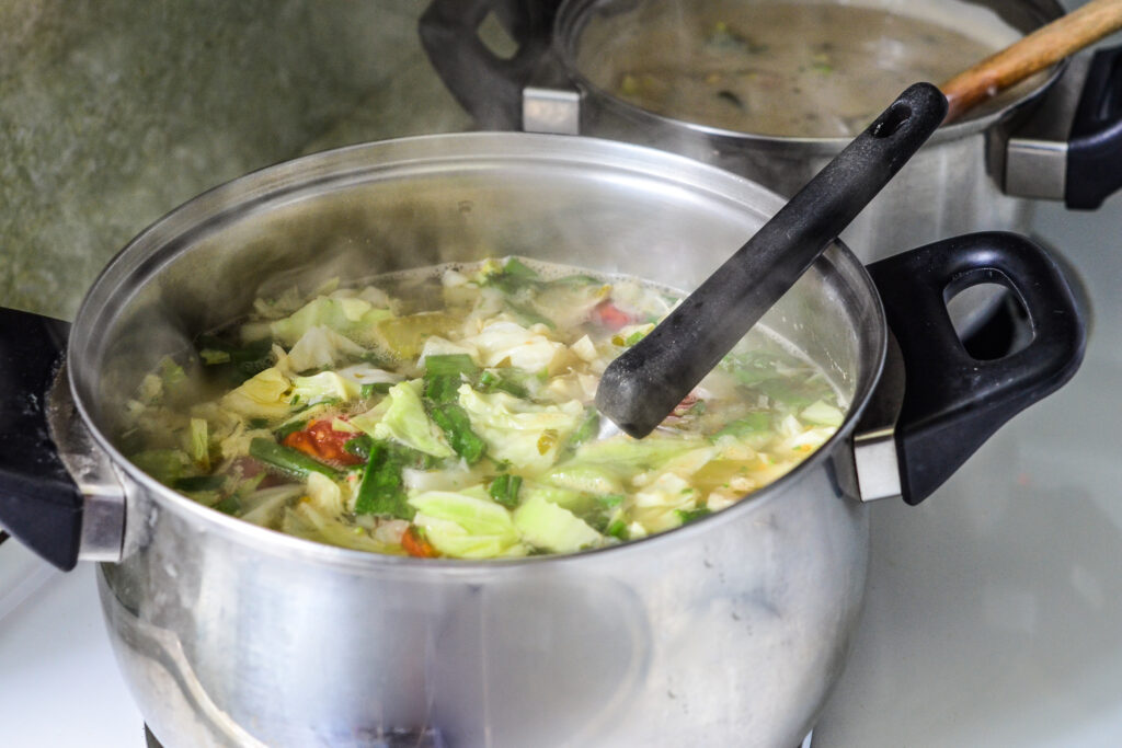 Simmering the  callaloo Soup 