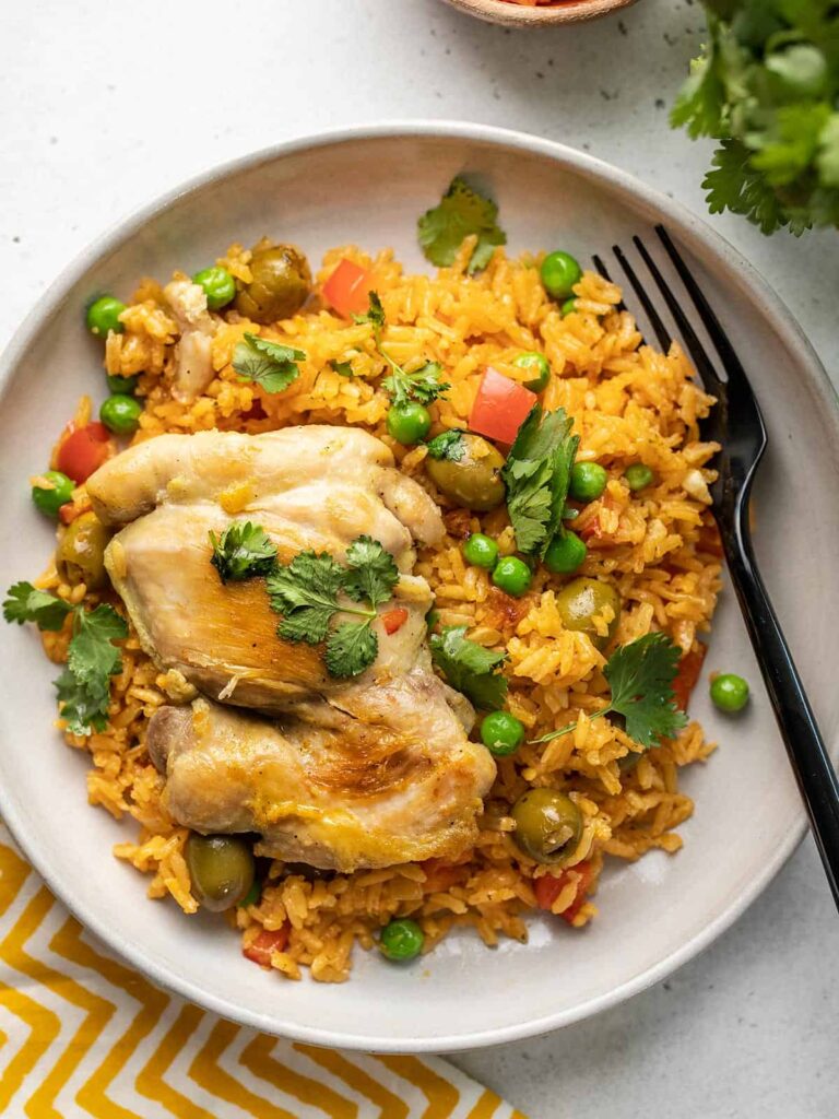 Protein Power: Since Arroz con Gandules has some protein from the pigeon peas, you can go lighter on protein in other meals. A small piece of chicken or fish will do.