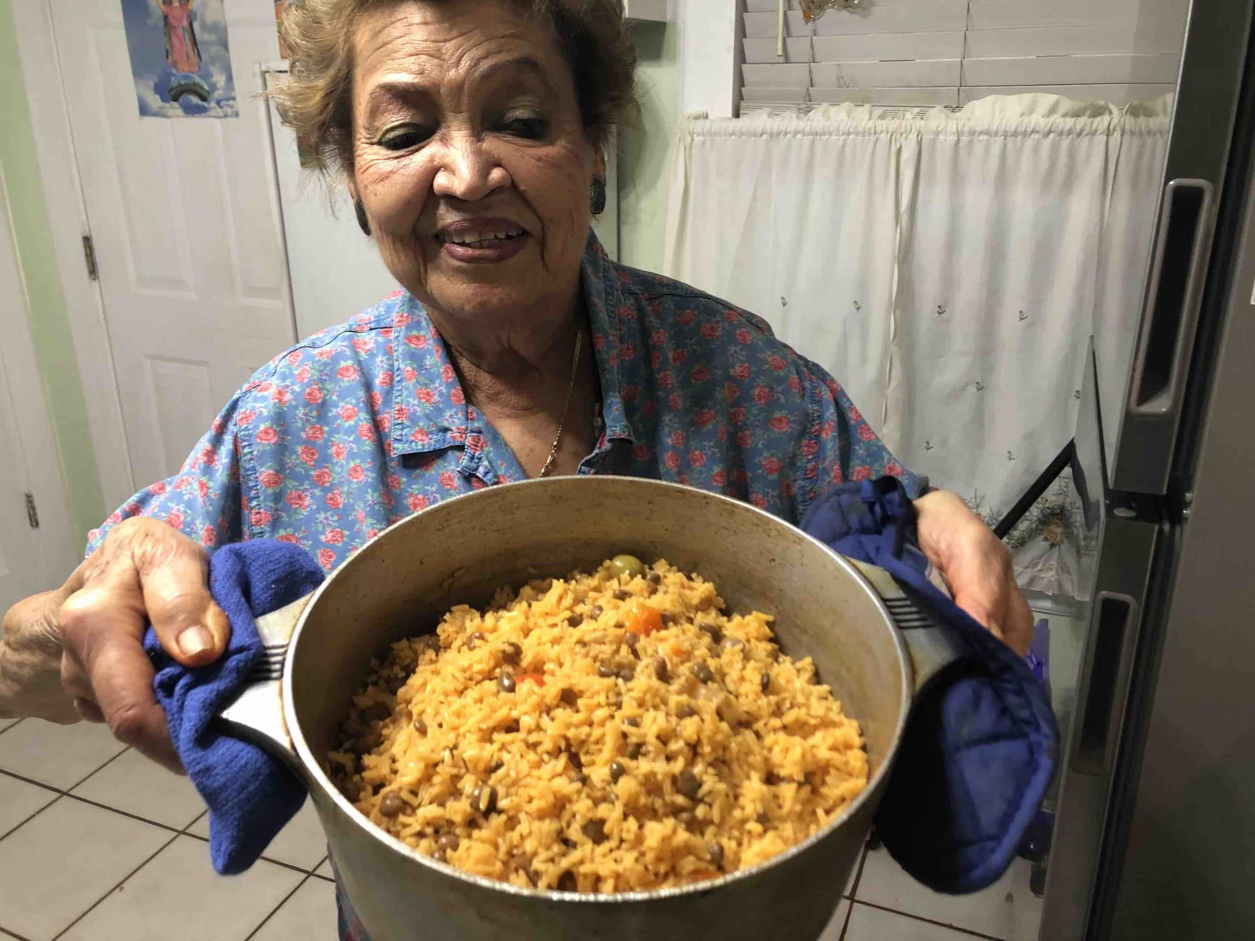 In Puerto Rican families, cooking is a way to bring everyone together. Kids learn how to make Arroz con Gandules by watching their parents and grandparents. It’s not just about following a recipe; it’s about feeling the rhythm of the kitchen and knowing when the dish is perfect.