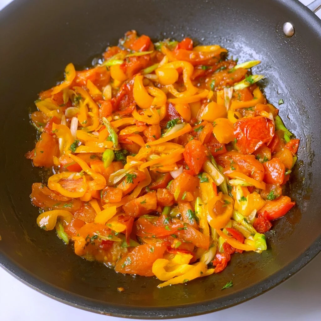 Saltfish with onions, peppers, and spices