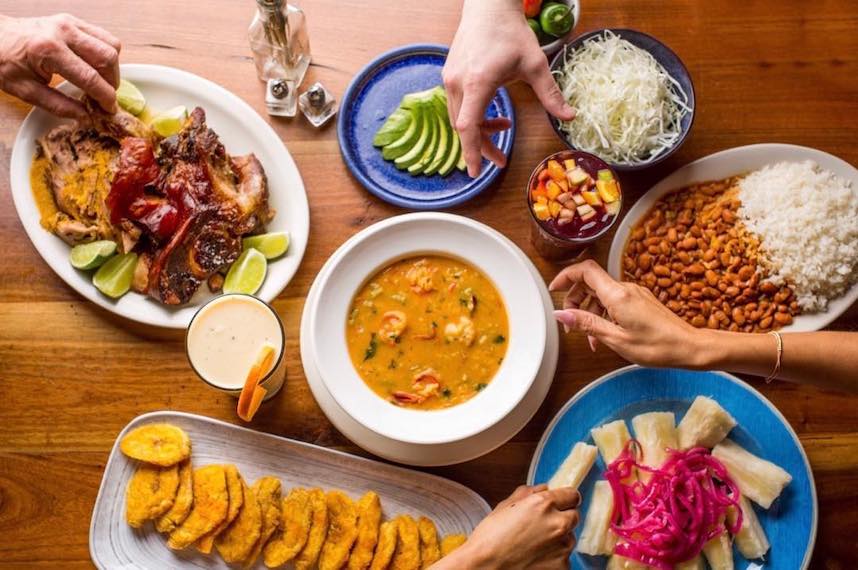 Sancocho people eating together