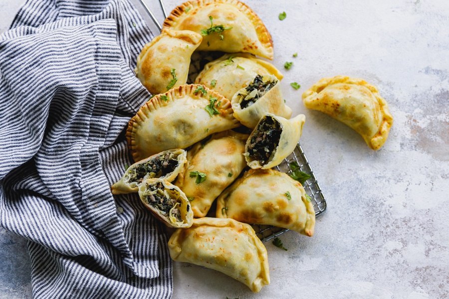 Mediterranean-inspired empanada filling made with spinach, olives, and artichokes.