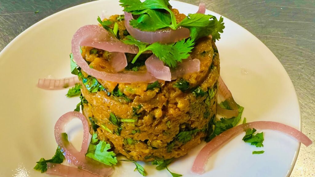 Vegetarian mofongo Topping with herbs and onion 