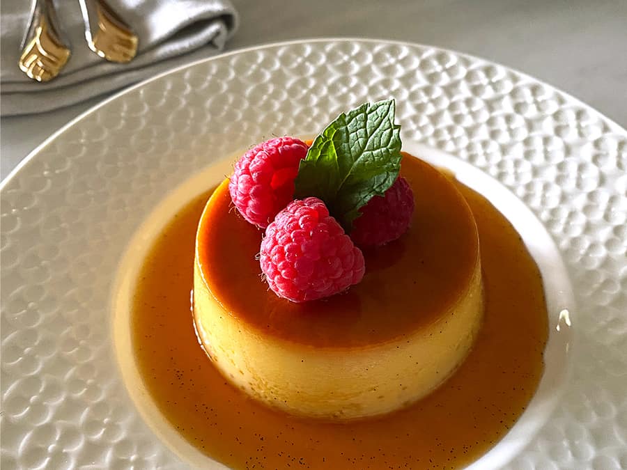 TWISTS ON TRADITIONAL CUBAN DISHES Flan Cubano Topping With Berry