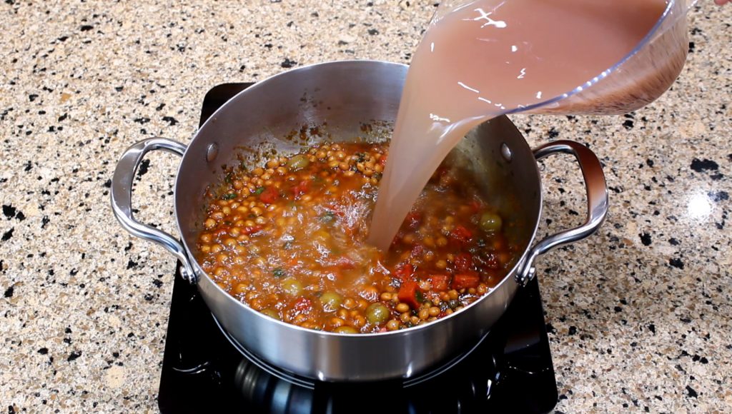 Boil the rice and pigeon peas together with a little bit of water until they’re soft