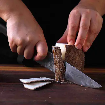 Peeling and Grating Cassava