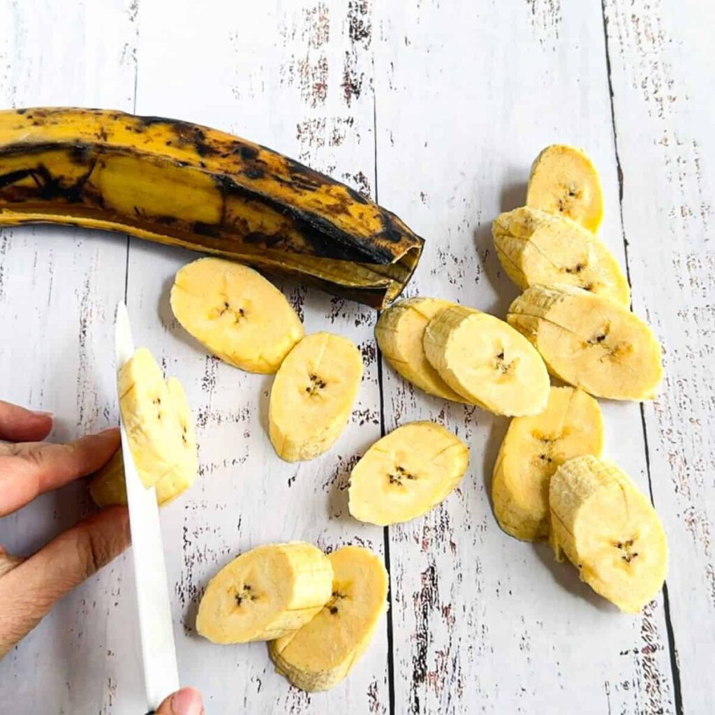 Preparing the Plantains: How to Peel, Slice, and Fry for the Perfect Texture