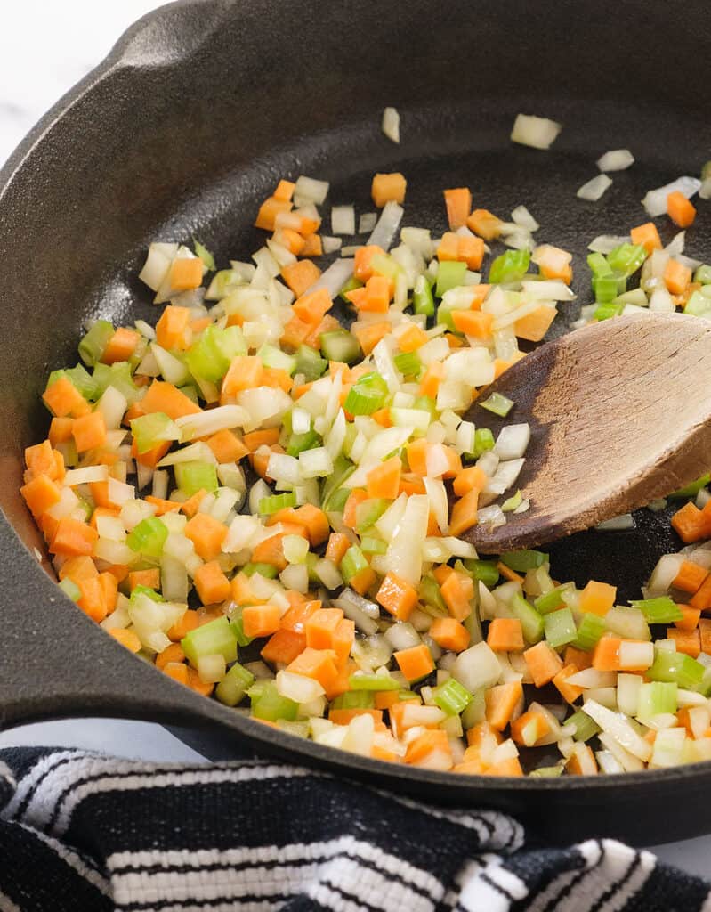 Preparing the Sofrito Vegetables: Chopping, Mincing, and Sautéing